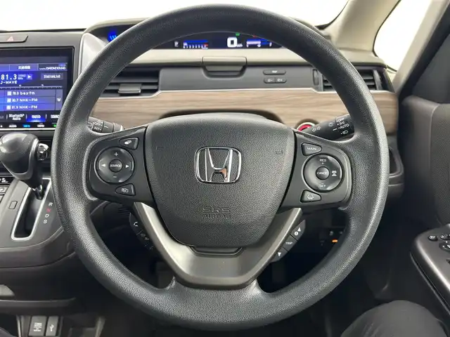 ホンダ フリード G ホンダセンシング 千葉県 2021(令3)年 3.1万km クリスタルブラックパール 禁煙車/ホンダセンシング/純正9型ナビ（VXM-217VFNi）/CD/DVD/SD/USB/Bluetooth/フルセグTV/バックカメラ/両側電動スライドドア/衝突軽減ブレーキ/レーダークルーズコントロール/レーンアシスト/横滑り防止機能/アイドリングストップ/シートヒーター/ビルトインETC/LEDオートライト/後席ロールサンシェード/スマートキー/プッシュスタート/スペアキー1本/取扱説明書/保証書