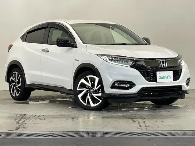 ホンダ ヴェゼル ハイブリッド RS ホンダセンシング 栃木県 2020(令2)年 5.4万km プラチナホワイトパール ＳＤナビ/（ＣＤ／ＤＶＤ／フルセグＴＶ）/バックカメラ/ホンダセンシング/アダプティブ・クルーズ・コントロール/車線維持支援システム/衝突軽減ブレーキ/歩行者検知機能/誤発進抑制機能/ミリ波レーダー検知/歩行者事故低減ステアリング/路外逸脱抑制機能/先行車発進お知らせ機能/標識認識機能/ＥＴＣ/ＬＥＤヘッドライト　/ハーフレザーシート　/スマートキー　/プッシュスタート　/ドライブレコーダー　/シートヒーター/純正18インチアルミホイール　