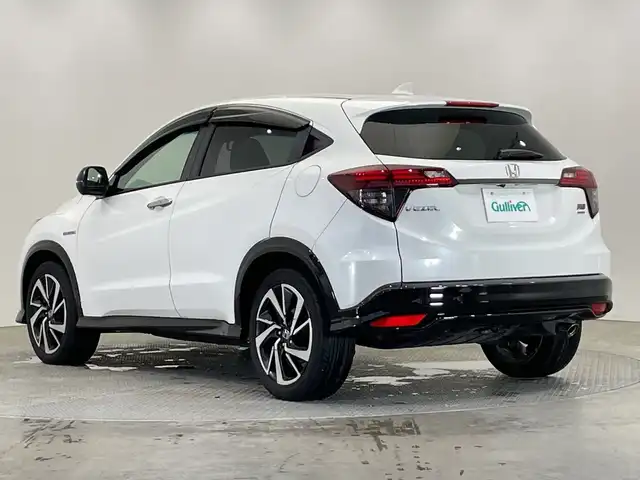ホンダ ヴェゼル ハイブリッド RS ホンダセンシング 栃木県 2020(令2)年 5.4万km プラチナホワイトパール ＳＤナビ/（ＣＤ／ＤＶＤ／フルセグＴＶ）/バックカメラ/ホンダセンシング/アダプティブ・クルーズ・コントロール/車線維持支援システム/衝突軽減ブレーキ/歩行者検知機能/誤発進抑制機能/ミリ波レーダー検知/歩行者事故低減ステアリング/路外逸脱抑制機能/先行車発進お知らせ機能/標識認識機能/ＥＴＣ/ＬＥＤヘッドライト　/ハーフレザーシート　/スマートキー　/プッシュスタート　/ドライブレコーダー　/シートヒーター/純正18インチアルミホイール　