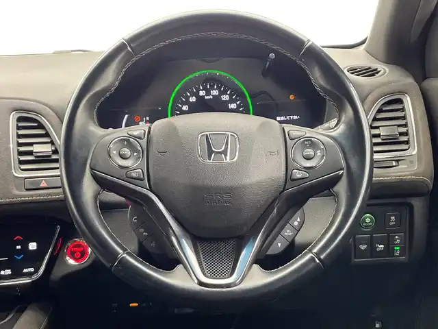 ホンダ ヴェゼル ハイブリッド RS ホンダセンシング 栃木県 2020(令2)年 5.4万km プラチナホワイトパール ＳＤナビ/（ＣＤ／ＤＶＤ／フルセグＴＶ）/バックカメラ/ホンダセンシング/アダプティブ・クルーズ・コントロール/車線維持支援システム/衝突軽減ブレーキ/歩行者検知機能/誤発進抑制機能/ミリ波レーダー検知/歩行者事故低減ステアリング/路外逸脱抑制機能/先行車発進お知らせ機能/標識認識機能/ＥＴＣ/ＬＥＤヘッドライト　/ハーフレザーシート　/スマートキー　/プッシュスタート　/ドライブレコーダー　/シートヒーター/純正18インチアルミホイール　