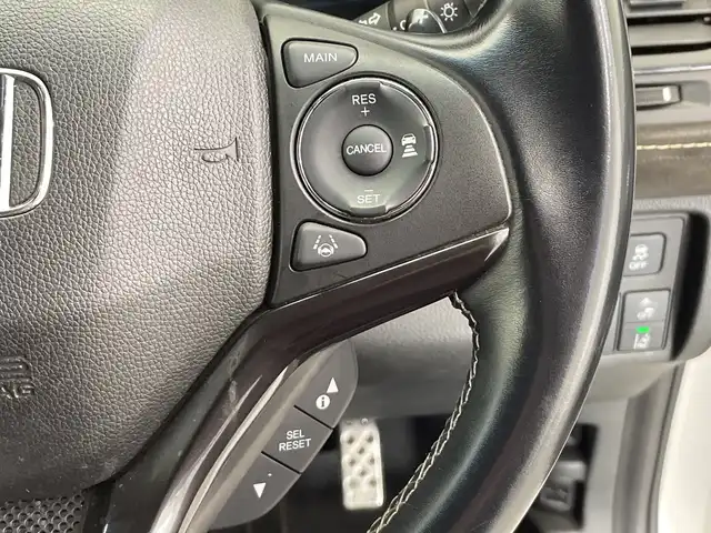 ホンダ ヴェゼル ハイブリッド RS ホンダセンシング 栃木県 2020(令2)年 5.4万km プラチナホワイトパール ＳＤナビ/（ＣＤ／ＤＶＤ／フルセグＴＶ）/バックカメラ/ホンダセンシング/アダプティブ・クルーズ・コントロール/車線維持支援システム/衝突軽減ブレーキ/歩行者検知機能/誤発進抑制機能/ミリ波レーダー検知/歩行者事故低減ステアリング/路外逸脱抑制機能/先行車発進お知らせ機能/標識認識機能/ＥＴＣ/ＬＥＤヘッドライト　/ハーフレザーシート　/スマートキー　/プッシュスタート　/ドライブレコーダー　/シートヒーター/純正18インチアルミホイール　