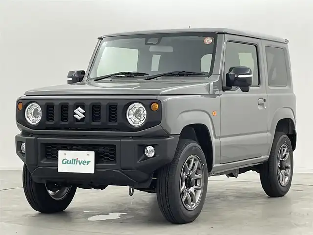スズキ ジムニー XC 群馬県 2025(令7)年 0.1万km未満 ミディアムグレー 届出済未使用車　登録時走行距離62km/―――――――――――――――/純正SDナビ/（フルセグTV/BT/CD/DVD）/スズキセーフティサポート/・デュアルセンサーブレーキサポート/・車線逸脱警報機能/・ふらつき警報機能/・先行車発進お知らせ機能/・ハイビームアシスト/・標識認識/リヤパーキングセンサー/クルーズコントロール/前席シートヒーター/LEDヘッドライト/フォグランプ/純正アルミホイール/ダウンヒルアシストコントロール/プッシュスタート/スマートキー