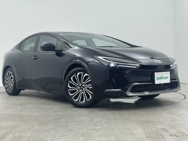 トヨタ プリウス Z 三重県 2023(令5)年 1.8万km アティチュードブラックマイカ 禁煙車　/ＢＳＭ　/全方位モニター　/モデリスタアルミ　/純正ナビ/AM/FM/BT/HDMI/USB/フルセグTV　/デジタルインナーミラー　/パワーバックドア　/シートヒーター・エアシート　/ワイヤレス充電　/ステアリングヒーター　/スタッドレスタイヤ積込　/２．０ＥＴＣ/レーダークルーズコントロール/トヨタセーフティセンス/AC100V電源