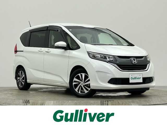 ホンダ フリード G ホンダセンシング 宮城県 2018(平30)年 6.9万km ホワイトオーキッドパール 純正ナビ/・AM/FM/CD/DVD/BT/SD/・バックカメラ/・フルセグTV//ホンダセンシング/・衝突軽減ブレーキ/・誤発進抑制機能/・アダプティブクルーズコントロール/・路外逸脱抑制機能/・先行車発進お知らせ/・標識認識機能//ステアリングスイッチ//アイドリングストップ//両側電動スライドドア//ETC//純正フロアマット//LEDヘッドライト//電動格納ミラー/・ウインカーミラー//プッシュスタート//スマートキー//保証書