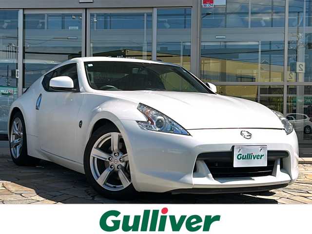 日産 フェアレディ Ｚ 静岡県 2011(平23)年 6.1万km ブリリアントホワイトパール 純正ナビ/・Bluetooth/・FM/AM/・CD/DVD/・AUX/・フルセグTV/主要装備/・ＥＴＣ/・バックカメラ/・パドルシフト/・ＭＴモード付ＡＴ/・プッシュスタート/・キセノンヘッドライト/・スマートキー/・オートライト/・横滑り防止装置/・サイドカーテンエアバッグ/・18インチ純正アルミ/・純正フロアマット