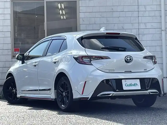 トヨタ カローラ スポーツ ハイブリッドG スタイルPKG 福岡県 2020(令2)年 3.4万km プラチナホワイトパールマイカ TRDエアロ【フロント・リア・サイド】/TRDドアハンドルプロテクター/TRDペダルカバー【ブレーキ・アクセル】/サイドドアアンダーガーニッシュ/ステアリングガーニッシュ/専用ドリンクホルダー(D席)/黒ハーフレザーシート/純正9インチディスプレイオーディオ/(USB/AM/FM/Bluetooth/CD/DVD/フルセグTV】/CD・DVDデッキ/バックカメラ/ビルトインETC/前後ドライブレコーダーCOMTEC【DC-DR652】/Toyota Safety Sense/・PCS(プリクラッシュセーフティ)/・LTA(レーントレーシングアシスト)/・RSA(ロードサインアシスト)/・オートマチックハイビーム/・先行車発進告知機能/・レーダークルーズコントロール(全車速追従機能付き)/BSM(ブラインドスポットモニター)/RCTA(リヤクロストラフィックアラート)/PKSB(パーキングサポートブレーキ)/オートライト/クリアランスソナー/コーナーセンサー/シートヒーター(D/N席)/ブレーキホールド/電格ウィンカーミラー/純正フロアマット/純正16インチアルミホイール/USB充電ソケット/スペアキー×１/ドアバイザー/取扱説明書/保証書