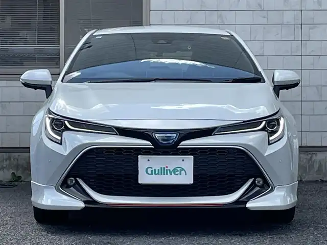 トヨタ カローラ スポーツ ハイブリッドG スタイルPKG 福岡県 2020(令2)年 3.4万km プラチナホワイトパールマイカ TRDエアロ【フロント・リア・サイド】/TRDドアハンドルプロテクター/TRDペダルカバー【ブレーキ・アクセル】/サイドドアアンダーガーニッシュ/ステアリングガーニッシュ/専用ドリンクホルダー(D席)/黒ハーフレザーシート/純正9インチディスプレイオーディオ/(USB/AM/FM/Bluetooth/CD/DVD/フルセグTV】/CD・DVDデッキ/バックカメラ/ビルトインETC/前後ドライブレコーダーCOMTEC【DC-DR652】/Toyota Safety Sense/・PCS(プリクラッシュセーフティ)/・LTA(レーントレーシングアシスト)/・RSA(ロードサインアシスト)/・オートマチックハイビーム/・先行車発進告知機能/・レーダークルーズコントロール(全車速追従機能付き)/BSM(ブラインドスポットモニター)/RCTA(リヤクロストラフィックアラート)/PKSB(パーキングサポートブレーキ)/オートライト/クリアランスソナー/コーナーセンサー/シートヒーター(D/N席)/ブレーキホールド/電格ウィンカーミラー/純正フロアマット/純正16インチアルミホイール/USB充電ソケット/スペアキー×１/ドアバイザー/取扱説明書/保証書