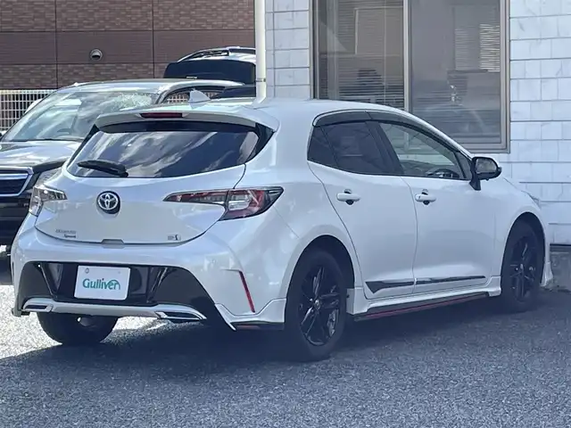 トヨタ カローラ スポーツ ハイブリッドG スタイルPKG 福岡県 2020(令2)年 3.4万km プラチナホワイトパールマイカ TRDエアロ【フロント・リア・サイド】/TRDドアハンドルプロテクター/TRDペダルカバー【ブレーキ・アクセル】/サイドドアアンダーガーニッシュ/ステアリングガーニッシュ/専用ドリンクホルダー(D席)/黒ハーフレザーシート/純正9インチディスプレイオーディオ/(USB/AM/FM/Bluetooth/CD/DVD/フルセグTV】/CD・DVDデッキ/バックカメラ/ビルトインETC/前後ドライブレコーダーCOMTEC【DC-DR652】/Toyota Safety Sense/・PCS(プリクラッシュセーフティ)/・LTA(レーントレーシングアシスト)/・RSA(ロードサインアシスト)/・オートマチックハイビーム/・先行車発進告知機能/・レーダークルーズコントロール(全車速追従機能付き)/BSM(ブラインドスポットモニター)/RCTA(リヤクロストラフィックアラート)/PKSB(パーキングサポートブレーキ)/オートライト/クリアランスソナー/コーナーセンサー/シートヒーター(D/N席)/ブレーキホールド/電格ウィンカーミラー/純正フロアマット/純正16インチアルミホイール/USB充電ソケット/スペアキー×１/ドアバイザー/取扱説明書/保証書