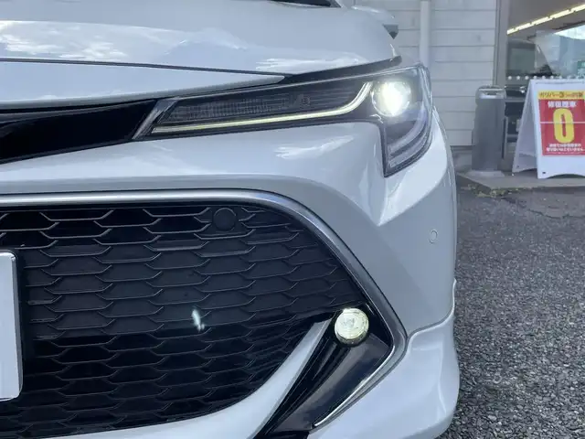 トヨタ カローラ スポーツ ハイブリッドG スタイルPKG 福岡県 2020(令2)年 3.4万km プラチナホワイトパールマイカ TRDエアロ【フロント・リア・サイド】/TRDドアハンドルプロテクター/TRDペダルカバー【ブレーキ・アクセル】/サイドドアアンダーガーニッシュ/ステアリングガーニッシュ/専用ドリンクホルダー(D席)/黒ハーフレザーシート/純正9インチディスプレイオーディオ/(USB/AM/FM/Bluetooth/CD/DVD/フルセグTV】/CD・DVDデッキ/バックカメラ/ビルトインETC/前後ドライブレコーダーCOMTEC【DC-DR652】/Toyota Safety Sense/・PCS(プリクラッシュセーフティ)/・LTA(レーントレーシングアシスト)/・RSA(ロードサインアシスト)/・オートマチックハイビーム/・先行車発進告知機能/・レーダークルーズコントロール(全車速追従機能付き)/BSM(ブラインドスポットモニター)/RCTA(リヤクロストラフィックアラート)/PKSB(パーキングサポートブレーキ)/オートライト/クリアランスソナー/コーナーセンサー/シートヒーター(D/N席)/ブレーキホールド/電格ウィンカーミラー/純正フロアマット/純正16インチアルミホイール/USB充電ソケット/スペアキー×１/ドアバイザー/取扱説明書/保証書