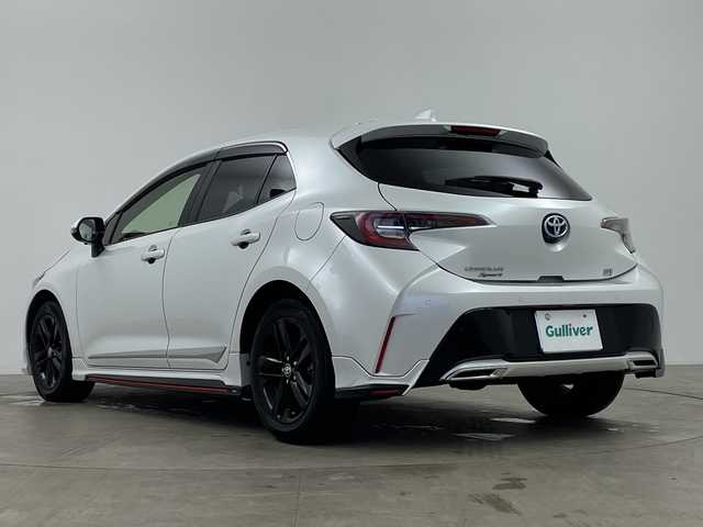 トヨタ カローラ スポーツ ハイブリッドG スタイルPKG 鹿児島県 2020(令2)年 3.4万km プラチナホワイトパールマイカ TRDエアロ【フロント・リア・サイド】/TRDドアハンドルプロテクター/TRDペダルカバー【ブレーキ・アクセル】/サイドドアアンダーガーニッシュ/ステアリングガーニッシュ/専用ドリンクホルダー(D席)/黒ハーフレザーシート/純正9インチディスプレイオーディオ/(USB/AM/FM/Bluetooth/CD/DVD/フルセグTV/ナビキット】/CD・DVDデッキ/バックカメラ/ビルトインETC/前後ドライブレコーダーCOMTEC【DC-DR652】/Toyota Safety Sense/・PCS(プリクラッシュセーフティ)/・LTA(レーントレーシングアシスト)/・RSA(ロードサインアシスト)/・オートマチックハイビーム/・先行車発進告知機能/・レーダークルーズコントロール(全車速追従機能付き)/BSM(ブラインドスポットモニター)/RCTA(リヤクロストラフィックアラート)/PKSB(パーキングサポートブレーキ)/オートライト/クリアランスソナー/コーナーセンサー/シートヒーター(D/N席)/ブレーキホールド/電格ウィンカーミラー/純正フロアマット/純正16インチアルミホイール/USB充電ソケット/スペアキー×１/ドアバイザー/取扱説明書/保証書