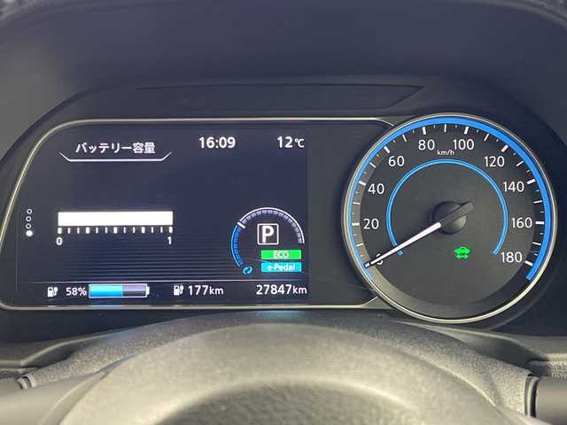 日産 リーフ X 岐阜県 2021(令3)年 2.8万km ブリリアントホワイトパール 純正ナビ/Bluetooth/USB/HDMI/フルセグTV/バックカメラ/エマージェンシーブレーキ/車線逸脱警報/道路標識表示/コーナーセンサー/シートヒーター/ステアリングヒーター/ビルトインETC/ドライブレコーダー/オートLEDヘッドライト/プッシュスタート/純正16インチアルミホイール