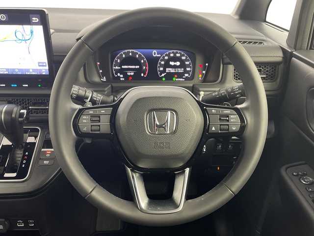 ホンダ ステップワゴン スパーダ 新潟県 2023(令5)年 1.8万km クリスタルブラックパール ギャザズ11.4型メモリナビ/CD/DVD/BT/バックカメラ/ETC/フルセグ/純正15型フリップダウンモニター/両側パワースライドドア/パワーテールゲート/オートクルーズ/シートヒーター　D席/N席/純正アルミ16インチ/ホンダセンシング/ハーフレザーシート