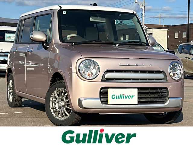 スズキ ラパン ショコラ X 道南・函館 2014(平26)年 8.7万km シャンパンピンクPM /社外ナビ//フルセグＴＶ//夏冬タイヤ//ドライブレコーダー//バックカメラ//運転席シートヒーター//オートライト//ＨＩＤヘッドライト//プッシュスタート//アイドリングストップ//純正フロアマット//スペアキー１本