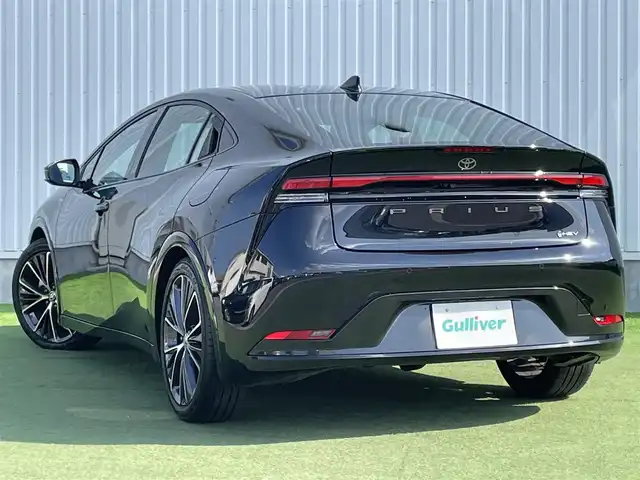 トヨタ プリウス Z 香川県 2024(令6)年 2.6万km アティチュードブラックマイカ 登録時走行距離：25892km/メーカー純正12.3型メモリナビ/　BT接続　フルセグTV/全方位カメラ/パーキングサポート/プリクラッシュセーフティシステム/レーダークルーズコントロール/レーンキープアシスト/クリアランスソナー/ブラインドスポットモニター/オートハイビーム/LEDヘッドライト/オートライト/ブラックレザーシート/シートヒーター/シートベンチレーション/パワーシート/シートメモリ/革巻きステアリング/ステアリングスイッチ/ステアリングヒーター/AC100V充電/置くだけ充電/ビルトインETC2.0/プッシュスタート/スマートキー