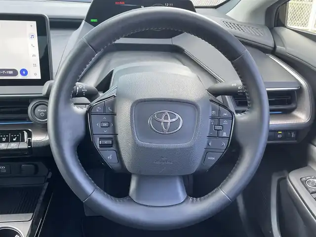 トヨタ プリウス Z 香川県 2024(令6)年 2.6万km アティチュードブラックマイカ 登録時走行距離：25892km/メーカー純正12.3型メモリナビ/　BT接続　フルセグTV/全方位カメラ/パーキングサポート/プリクラッシュセーフティシステム/レーダークルーズコントロール/レーンキープアシスト/クリアランスソナー/ブラインドスポットモニター/オートハイビーム/LEDヘッドライト/オートライト/ブラックレザーシート/シートヒーター/シートベンチレーション/パワーシート/シートメモリ/革巻きステアリング/ステアリングスイッチ/ステアリングヒーター/AC100V充電/置くだけ充電/ビルトインETC2.0/プッシュスタート/スマートキー