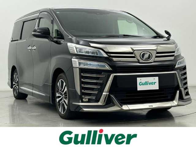 トヨタ ヴェルファイア Z Gエディション 熊本県 2018(平30)年 3.7万km バーニングブラッククリスタルシャインガラスフレーク モデリスタエアロフル/純正ナビNSZN-Z68T（ＣＤ・ＤＶＤ・フルセグ・ＢＴ）/バックカメラ　/社外前方ドライブレコーダー　/純正フリップダウンモニター/ビルトインＥＴＣ２．０　/トヨタセーフティーセンス/・プリクラッシュセーフティ/・レーンキープアシスト/・レーンディパーチャーアラート/・アダブティブクルーズコントロール/・オートハイビーム/・ロードサインアシスト/・駐車時支援パーキングサポートシステム/横滑り防止/前後クリアランスソナー　/パワーバックドア　/前席シートヒーター　/前席エアーシート　/前席パワーシート/ステアリングヒーター/助手席・2列目オットマン/レザーシート/電動パーキング/ブレーキホールド/純正フロアマット/純正１８インチAW/オートライト/LEDヘッドライト/フォグライト/スマートキー/プッシュスタート/スペアキー1本/保証書/取扱説明書