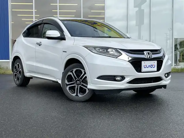 ホンダ ヴェゼル ハイブリッド Z 福島県 2015(平27)年 10.8万km ホワイトオーキッドパール （株）IDOMが運営する【じしゃロンいわき店】の/自社ローン専用車両になります。/こちらは現金またはオートローンご利用時の価格です。/自社ローンご希望の方は別途その旨お申し付けください//メモリナビ/フルセグテレビ/DVD BT CD/バックカメラ/純正アルミホイール/クルーズコントロール/ETC/HID