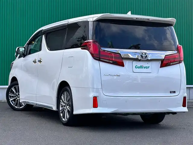 トヨタ アルファード S タイプゴールドⅢ 宮城県 2023(令5)年 2.6万km ホワイトパールクリスタルシャイン ツインムーンルーフ/スペアタイヤ/＝＝＝/セーフティセンス/・プリクラッシュセーフティ/・レーントレーシングアシスト/・ロードサインアシスト/・アダプティブハイビームシステム/・レーダークルーズコントロール（全車速追従機能付）/ブラインドスポットモニター/パーキングサポートブレーキ（後方接近車両/前後静止物）/純正12インチフリップダウンモニター（V12T-R68C）/9インチディスプレイオーディオ/・CD/DVDデッキ/・Bluetooth/バックカメラ/ビルトインETC/ミラー一体型ドライブレコーダー/AC100V/100Wコンセント/パワーバックドア/両側パワースライドドア/ハーフレザーシート/革巻きステアリング/電動パーキングブレーキ/ブレーキホールド/3眼LEDヘッドランプ/フォグランプ/オートライト/スマートキー＆プッシュスタート/純正18インチAW/フロアマット/ドアバイザー/W/サイド/カーテンエアバッグ