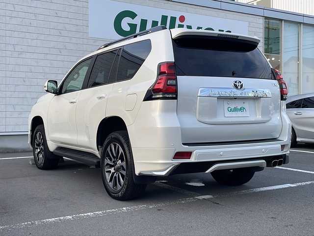 トヨタ ランドクルーザー プラド TX Lパッケージ 静岡県 2023(令5)年 1.7万km ホワイトパールクリスタルシャイン メーカーナビ/地デジTV/バック/全周囲カメラ/モデリスタエアロ/サンルーフ/レザーシート＆エアシート/純正19インチAW/2.0ETC/スマートキー/保証書/取説