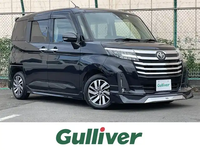 トヨタ ルーミー カスタムG 東京都 2021(令3)年 1.7万km 黒 純正9型ナビ/TV/CD/DVD/バックカメラ/純正12.1型フリップダウンモニター/モデリスタエアロ /前席シートヒーター/ウェルカムパワースライドドア/ビルトインETC2.0/ドライブレコーダー/追従クルーズ