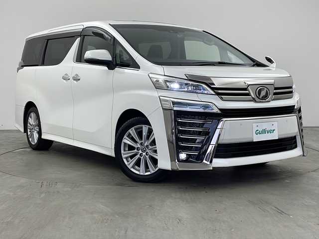 トヨタ ヴェルファイア Z 兵庫県 2018(平30)年 4.7万km ホワイトパールクリスタルシャイン ・純正10インチナビ/CD/DVD/BT/SD/TV/・ツインムーンルーフ/・トヨタセーフティセンス/・レーダークルーズコントロール/・レーントレーシングアシスト/・クリアランスソナー/・パーキングサポートブレーキ/・プリクラッシュセーフティ/・ブラインドスポットモニター/・ロードサインアシスト/・先行車発進告知/・オートマチックハイビーム/・LEDオートライト/・フォグランプ/・両側パワースライドドア/・バックカメラ/・nanoe/・TVキット/・ビルトインETC/・前後ドライブレコーダー/・オットマン/・電動パーキングブレーキ/・ブレーキホールド/・横滑り防止装置/・純正18インチアルミホイール/・純正フロアマット/・レーダー探知機/・ステアリングリモコン/・ドアバイザー/・パワーバックドア/・スマートキー/・スペアキー/・プッシュスタート/・MTモード付AT/・デジタルインナーミラー/・革巻きステアリング/・WAC/・オールオートパワーウィンドウ/・W＋サイドエアバッグ/・カーテンエアバッグ