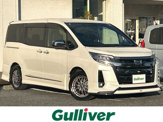 トヨタ ノア ハイブリッド Si ダブルバイビーⅢ 千葉県 2021(令3)年 4.1万km ホワイトパールクリスタルシャイン モデリスタエアロ　10型ナビNSZN-Z68T　フリップダウンモニター　バックカメラ　両側電動スライドドア　シートヒーター　セーフティセンス　２．０ETC　クルコン　ドラレコ　コンビハンドル　LED