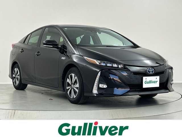 トヨタ プリウス ＰＨＶ A ナビパッケージ 福島県 2020(令2)年 3.2万km アティチュードブラックマイカ ／禁煙車/／純正１１．６型ナビ/／パノラミックビューモニター/／衝突軽減ブレーキ/／ブラインドスポットモニター/／ヘッドアップディスプレイ/／パーキングアシスト/／レーダクルーズコントロール/／１００V電源/／ＥＴＣ2.0/／フルセグTV/／前席シートヒーター/／運転席パワーシート/／クリアランスソナー/／車線逸脱警報/／Bluetooth/／スマートキー/／スペアキーあり