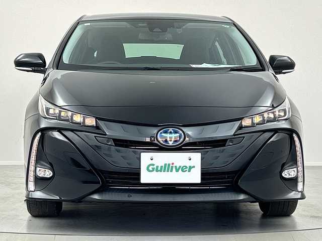 トヨタ プリウス ＰＨＶ A ナビパッケージ 福島県 2020(令2)年 3.2万km アティチュードブラックマイカ ／禁煙車/／純正１１．６型ナビ/／パノラミックビューモニター/／衝突軽減ブレーキ/／ブラインドスポットモニター/／ヘッドアップディスプレイ/／パーキングアシスト/／レーダクルーズコントロール/／１００V電源/／ＥＴＣ2.0/／フルセグTV/／前席シートヒーター/／運転席パワーシート/／クリアランスソナー/／車線逸脱警報/／Bluetooth/／スマートキー/／スペアキーあり