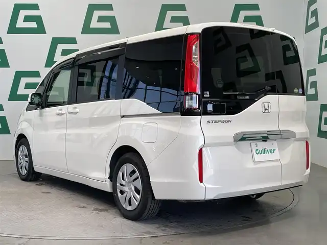 ホンダ ステップワゴン G ホンダセンシング 鹿児島県 2017(平29)年 5.7万km ホワイトオーキッドパール 禁煙車/純正ナビ/バックカメラ/両側パワースライドドア/ホンダセンシング/・クルーズコントロール/・衝突被害軽減ブレーキ/・車線維持支援システム/・誤発進抑制機能/・路外逸脱抑制機能/・先行者お知らせ機能/・標識認識機能/わくわくゲート/フルオートエアコン/ドアバイザー/純正フロアマット/電動格納ミラー/ETC