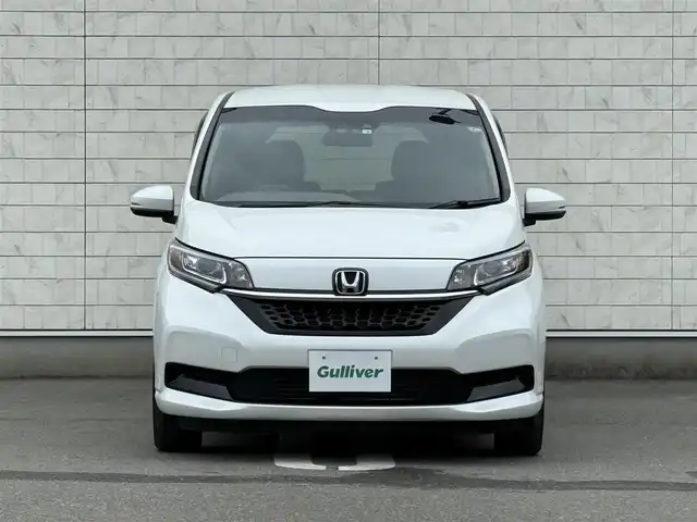 ホンダ フリード G ホンダセンシング 福岡県 2022(令4)年 0.9万km プラチナホワイトパール 純正9型SDナビ(フルセグTV/CD/DVD/BT)バックモニターホンダセンシングレーダークルコン両側パワスラドラレコETCシートヒーターUSBポート純正LEDヘッドライト純正フロアマットスマートキープッシュスタート