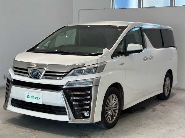 トヨタ ヴェルファイア ハイブリット ZR Gエディション 宮城県 2018(平30)年 7万km ホワイトパールクリスタルシャイン 4WD/純正ナビ/フルセグTV/Bluetooth、CD、DVD/両側パワースライドドア/電動リアゲート/トヨタセーフティセンス/・プリクラッシュセーフティー/・レーントレーシングアシスト/・レーンディパーチャーアラート/・レーダークルーズコントロール/・アダプティブハイビームシステムサポート/パーキングサポートブレーキ/クリアランスソナー/レザーシート/オットマン/パワーシート/シートヒーター/エアーシート/ETC/純正フロアマット/純正アルミホイール