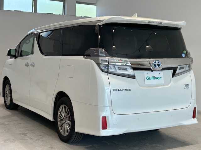 トヨタ ヴェルファイア ハイブリット ZR Gエディション 宮城県 2018(平30)年 7万km ホワイトパールクリスタルシャイン 4WD/純正ナビ/フルセグTV/Bluetooth、CD、DVD/両側パワースライドドア/電動リアゲート/トヨタセーフティセンス/・プリクラッシュセーフティー/・レーントレーシングアシスト/・レーンディパーチャーアラート/・レーダークルーズコントロール/・アダプティブハイビームシステムサポート/パーキングサポートブレーキ/クリアランスソナー/レザーシート/オットマン/パワーシート/シートヒーター/エアーシート/ETC/純正フロアマット/純正アルミホイール