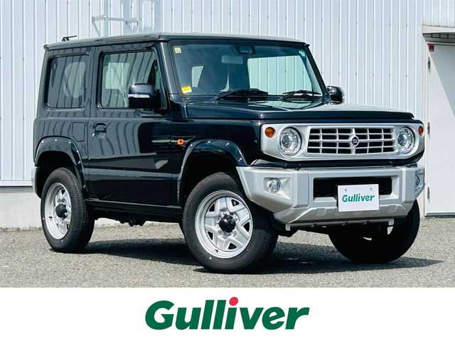 スズキ ジムニー XC 熊本県 2023(令5)年 0.7万km ブルーイッシュブラックパール3 スズキセーフティサポート/・デュアルセンサーブレーキ/・誤発進抑制機能/・車線逸脱警報機能/・ふらつき警報機能/・標識認識機能/・ハイビームアシスト/・先行車発進お知らせ/社外グリル/前後シルバーバンパー/オーバーフェンダー/前席シートヒーター/クルーズコントロール/LEDヘッドライト/・フォグランプ/純正フロアマット/革巻きステアリング/・ステアリングスイッチ/純正アルミホイール/電動格納ミラー/・ウインカーミラー/プッシュスタート/・スマートキー