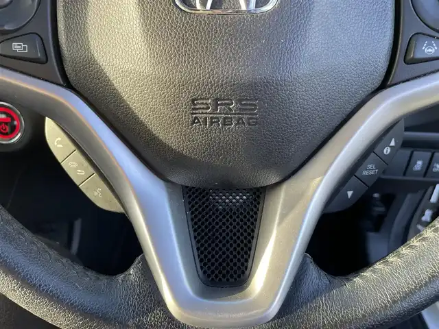 ホンダ シャトル ハイブリッド X ホンダセンシング 熊本県 2018(平30)年 11.2万km ホワイトオーキッドパール 純正ナビ（Gathers　VXM-187VFEi)/フルセグTV/BT/CD/DVD/USB/HDMI/ipod)/バックカメラ/純正フロアマット/ホンダセンシング/・路外逸脱抑制機能/・衝突軽減ブレーキ/・先行車発進お知らせ機能/・横滑り防止/・アダプティブクルーズコントロール/・車両接近お知らせ/・標識認識機能/・誤発進抑制機能/・歩行者事故低減ステアリング/・車線維持支援システム/・オートハイビーム/ハーフレザーシート/・D/Nシートヒーター/革巻きステアリング/・パドルシフト/・ステアリングリモコン/オートライト/・フォグライト/・LEDヘッドライト/ドアバイザー/スマートキー/・スペアキー×１