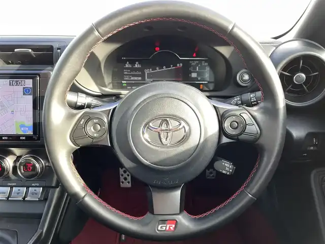 トヨタ ＧＲ８６ RZ 愛知県 2023(令5)年 5万km 赤 FUJITSUBOマフラー付き/・純正Tコネクト9インチメモリーナビ/・フルセグテレビ/・CD/DVD再生機能/・Bluetooth/USB/HDMI接続機能/・ウルトラスウェード×本革スポーツシート/・シートヒーター（運転席・助手席）/・純正18インチアルミホイール/・純正LEDヘッドライト/・オートライト/・FUJITSUBOマフラー/・トルセンLSD/・クルーズコントロール/・スマートキー/・MAX機能付きデュアルオートエアコン