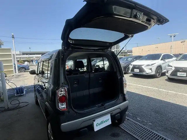 スズキ ハスラー G ターボ 東京都 2018(平30)年 12万km クールカーキPM 4WD/ターボ/レーダーブレーキサポート（衝突被害経伝ブレーキ）/誤発進抑制機能/アイドリングストップシステム/S -エネチャージ（ハイブリッド）/ハロゲンヘッドランプ/ボディ同色ルーフ/ルーフ同色ドアミラー（電動格納/ヒーター付）/ボディ同色アウトサイドドアハンドル/無塗装フェンダーアーチモール/シルバー加飾付無塗装リアバンパー/「HUSTLER」メッキエンブレム/リアワイパー/シルバー加飾付ウレタン製ステアリングホイール/チルトステアリング/SRSエアバッグ（運転席/助手席）/オートエアコン/シルバーエアコンパネル/エコクール/リアヒーターダクト/アシストグリップ（助手席/後席）/バニティミラー（運転席）/パイピング付モザイク柄ブラックファブリックシート/ベンチシート（前席）/シートバックテーブル（助手席）/シートヒーター（運転席/助手席）/シートリフター（運転席）/分割スライドシート（後席）/ヘッドレスト（運転席/助手席/後席）/キーレスプッシュスタートシステム/オーディオ無/2スピーカー/シルバースピーカーリング/ETC/グリップコントロール/HDC/横滑り防止装置