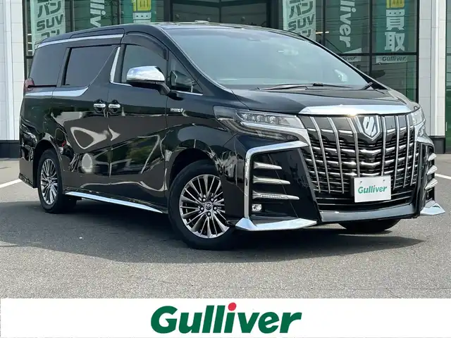 トヨタ アルファードハイブリット エグゼクティブ ラウンジ S 岡山県 2019(平31)年 5.9万km ブラック 登録時走行距離58391km/純正10.5インチナビ/フルセグTV/(AM.FM.TV.CD.DVD.BT)/全方位カメラ/ETC2.0/BSM/後席フリップダウン/JBLプレミアムサウンド/サンルーフ/置くだけ充電/衝突軽減ブレーキ/両側パワースライドドア/レーンキープアシスト/クルーズコントロール/横滑り防止装置/オートマチックハイビーム/アイドリングストップ/カーテンエアバック/シートヒーター(D+N席)/エアシート(D+N席)/17インチ純正AW/プッシュスタート/ステアリングヒーター/ブラインドスポットモニター/コーナーセンサー/電動リアゲート/パワーシート/LEDヘッドライト/USB入力端子/パーキングアシスト/HDMI