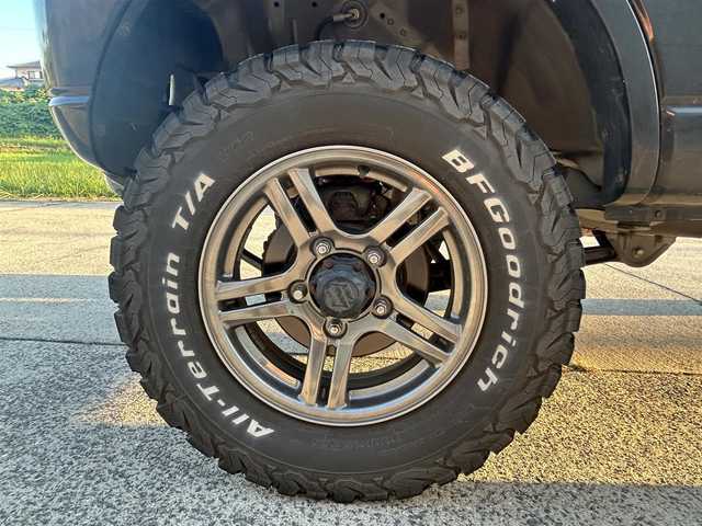 スズキ ジムニー ランドベンチャー 長崎県 2018(平30)年 7.9万km ブルーイッシュブラックパール3 社外メモリナビ/（CD/DVD/BT/フルセグ）/レザーシート/D席シートヒーター/フォグランプ/純正16インチAW/ドライブレコーダー/社外デジタルインナーミラー/ETC/社外マフラー/リフトアップ