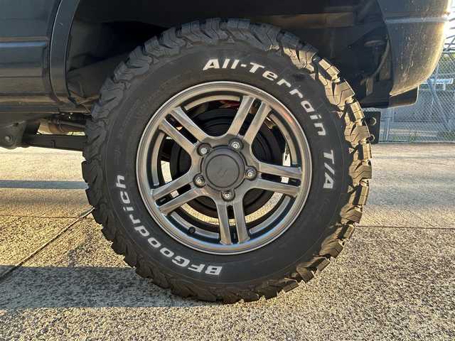 スズキ ジムニー ランドベンチャー 長崎県 2018(平30)年 7.9万km ブルーイッシュブラックパール3 社外メモリナビ/（CD/DVD/BT/フルセグ）/レザーシート/D席シートヒーター/フォグランプ/純正16インチAW/ドライブレコーダー/社外デジタルインナーミラー/ETC/社外マフラー/リフトアップ