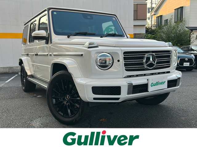 メルセデス・ベンツ ゲレンデヴァーゲン Ｇ４００ｄ AMGライン 東京都 2023(令5)年 0.5万km パール ワンオーナー/レーダーセーフティパッケージ/・アクティブブレーキ/・PRE-SAFE/・PRE-SAFEサウンド/・アクティブレーンキーピングアシスト/・ブラインドスポットアシスト/・アクティブディスタンスアシストディストロニック/・衝突警告システム/・トラフィックサインアシスト/ラグジュアリーパッケージ/・ガラススライディングルーフ/・Burmesterサラウンドシステム/Gマネファクトゥーアプログラムプラス/・ナッパ革シート/・ベージュシートベルト/・シートヒータープラス（前席）/・シートベンチレーター（前席）/・リラクゼーション機能（前席）/・アクティブマルチコントロールシートバック（前席）/・ドライビングダイナミックシート（前席）/COMANDシステム/・12.3インチワイドディスプレイ/・12.3インチコックピッドディスプレイ/・HDDナビ/・地デジTV/・SDカードスロット/・USBメディアインターフェース/・タッチパッド/タッチコントロールボタン/・ETC2.0/マルチビームLEDヘッドランプ/ボディ同色背面タイヤカバーリング/スマートキー×2/取扱説明書/保証書