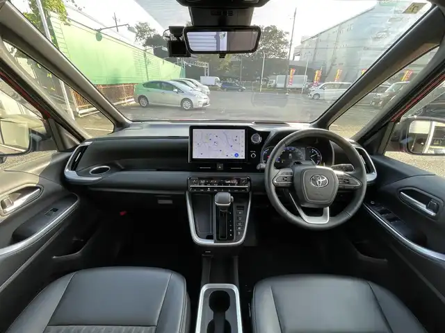 トヨタ ノア ハイブリッド S－Z 千葉県 2023(令5)年 5.8万km レッドマイカメタリック DPオーディオplus/・純正10.5インチモニターナビ/・CD/DVD/Bluetooth/フルセグ/両後パワースライドドア/バックカメラ/デジタルインナーミラー/アドバンスドドライブ（渋滞時支援機能）/トヨタセーフティーセンス/・プリクラッシュセーフティー/・レーントレーシングアシスト/・レーンチェンジアシスト/・フロントクロストラフィックアラート/・リアクロストラフィックアラート/・パーキングサポートブレーキ/・プロアクティブドライビングアシスト/・ブラインドスポットモニター/・ロードサインアシスト/・オートマチックハイビーム/アダプティブクルーズコントロール/前後コーナーセンサー/スマートキー/前席シートヒーター/AC100V1500W電源/ブレーキオートホールド/純正LEDヘッドライト/フォグランプ/純正17インチアルミホイール/前後ドライブレコーダー【TZ-DR210】/純正ビルトインETC2.0/サイド＆カーテンエアバッグ/新車時保証書＆取扱説明書