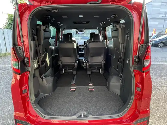 トヨタ ノア ハイブリッド S－Z 千葉県 2023(令5)年 5.8万km レッドマイカメタリック DPオーディオplus/・純正10.5インチモニターナビ/・CD/DVD/Bluetooth/フルセグ/両後パワースライドドア/バックカメラ/デジタルインナーミラー/アドバンスドドライブ（渋滞時支援機能）/トヨタセーフティーセンス/・プリクラッシュセーフティー/・レーントレーシングアシスト/・レーンチェンジアシスト/・フロントクロストラフィックアラート/・リアクロストラフィックアラート/・パーキングサポートブレーキ/・プロアクティブドライビングアシスト/・ブラインドスポットモニター/・ロードサインアシスト/・オートマチックハイビーム/アダプティブクルーズコントロール/前後コーナーセンサー/スマートキー/前席シートヒーター/AC100V1500W電源/ブレーキオートホールド/純正LEDヘッドライト/フォグランプ/純正17インチアルミホイール/前後ドライブレコーダー【TZ-DR210】/純正ビルトインETC2.0/サイド＆カーテンエアバッグ/新車時保証書＆取扱説明書