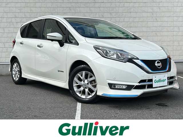 日産 ノート e－パワー メダリスト 栃木県 2016(平28)年 10.8万km ブリリアントホワイトパール ワンオーナー/純正SDナビ/・Bluetooth CD DVD/・TV フルセグ/・バックカメラ/純正エアロ/・e-スタイリングパッケージ　フロント　サイド　リアアンダー/純正ルーフスポイラー/デジタルインナーミラー/ハーフレザーシート/ドライブレコーダー/ETC/LEDヘッドライト/オートライト/衝突被害軽減システム/レーンキープアシスト/コーナーセンサー/取扱説明書/記録簿/保証書