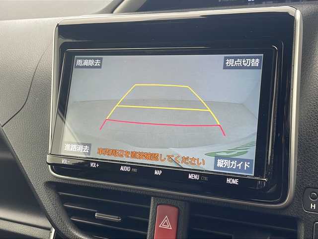 トヨタ ヴォクシー ZS 煌Ⅲ 沖縄県 2021(令3)年 4.9万km ホワイトパールクリスタルシャイン 純正9インチナビ（NSZT-Y68T）/　（BT/フルセグTV/CD/DVD）/バックカメラ/純正12インチフリップダウンモニター(V12T-R68C)/両側パワースライドドア/トヨタセーフティセンス/クルーズコントロール/衝突軽減ブレーキシステム/オートハイビーム/オートライト/LEDヘッドライト