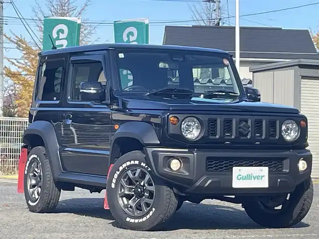 スズキ ジムニー シエラ JC 宮城県 2021(令3)年 3.1万km ブルーイッシュブラックパール3 ワンオーナー/クルーズコントロール追従なし/YOKOHAMA GEOLANDAR H/T ホワイトレター/　　　　純正アルミサマータイヤ(195/80R15)/背面タイヤ/デジタルインナーミラー一体型前後ドラレコ/カーオーディオユニットDEH-5600/(CD、BT、USB)/スペアキー×１/プッシュスタートボタン/シートヒーター/（運転席、助手席）/オートライト/ドアバイザー/電動格納ミラー/ヘッドライトウォッシャー/ディアルセンサーブレーキサポート/トランスファーレバー/プリクラッシュセーフティー/車線逸脱防止システム/フロア５MT/パートタイム４WD/ダウンヒルアシストコントロール/よこすべり防止切り替え