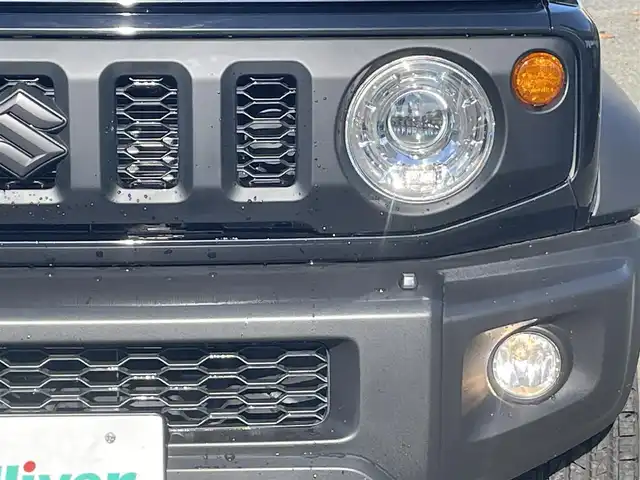 スズキ ジムニー シエラ JC 宮城県 2021(令3)年 3.1万km ブルーイッシュブラックパール3 ワンオーナー/クルーズコントロール追従なし/YOKOHAMA GEOLANDAR H/T ホワイトレター/　　　　純正アルミサマータイヤ(195/80R15)/背面タイヤ/デジタルインナーミラー一体型前後ドラレコ/カーオーディオユニットDEH-5600/(CD、BT、USB)/スペアキー×１/プッシュスタートボタン/シートヒーター/（運転席、助手席）/オートライト/ドアバイザー/電動格納ミラー/ヘッドライトウォッシャー/ディアルセンサーブレーキサポート/トランスファーレバー/プリクラッシュセーフティー/車線逸脱防止システム/フロア５MT/パートタイム４WD/ダウンヒルアシストコントロール/よこすべり防止切り替え