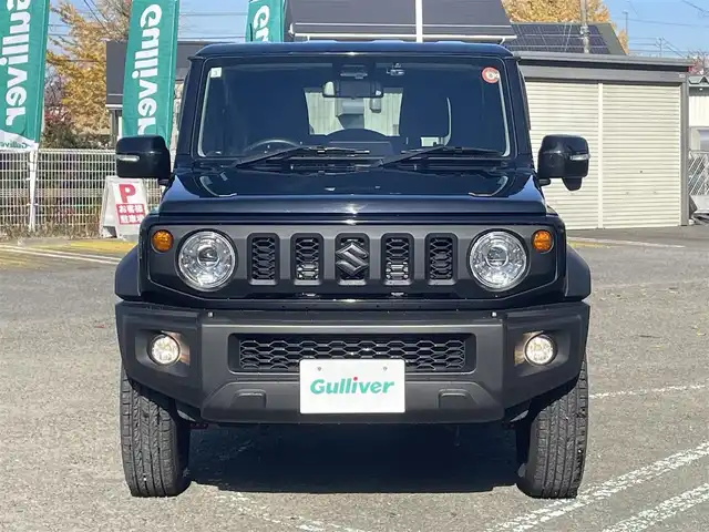 スズキ ジムニー シエラ JC 宮城県 2021(令3)年 3.1万km ブルーイッシュブラックパール3 ワンオーナー/クルーズコントロール追従なし/YOKOHAMA GEOLANDAR H/T ホワイトレター/　　　　純正アルミサマータイヤ(195/80R15)/背面タイヤ/デジタルインナーミラー一体型前後ドラレコ/カーオーディオユニットDEH-5600/(CD、BT、USB)/スペアキー×１/プッシュスタートボタン/シートヒーター/（運転席、助手席）/オートライト/ドアバイザー/電動格納ミラー/ヘッドライトウォッシャー/ディアルセンサーブレーキサポート/トランスファーレバー/プリクラッシュセーフティー/車線逸脱防止システム/フロア５MT/パートタイム４WD/ダウンヒルアシストコントロール/よこすべり防止切り替え