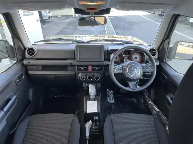 スズキ ジムニー ノマド FC 東京都 2025(令7)年 0.1千km 緑 登録済未使用車　/セーフティサポート　/ＬＥＤヘッドライト　/アイドリングストップ　/クルーズコントロール　/車線逸脱警報機能　/後退時ブレーキサポート　/ハイビームアシスト　/標識認識機能　/デュアルカメラブレーキ/プッシュエンジンスタート/ダウンヒルアシスト/プッシュエンジンスタ-ト/クリアランスソナー