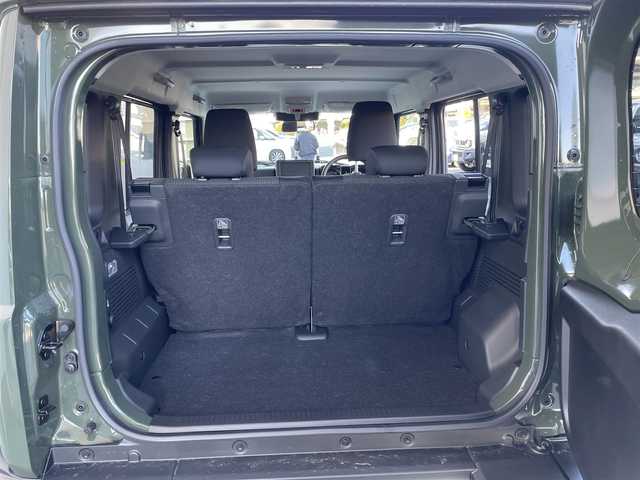 スズキ ジムニー ノマド FC 東京都 2025(令7)年 0.1千km 緑 登録済未使用車　/セーフティサポート　/ＬＥＤヘッドライト　/アイドリングストップ　/クルーズコントロール　/車線逸脱警報機能　/後退時ブレーキサポート　/ハイビームアシスト　/標識認識機能　/デュアルカメラブレーキ/プッシュエンジンスタート/ダウンヒルアシスト/プッシュエンジンスタ-ト/クリアランスソナー