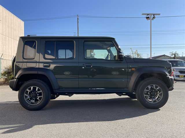 スズキ ジムニー ノマド FC 東京都 2025(令7)年 0.1千km 緑 登録済未使用車　/セーフティサポート　/ＬＥＤヘッドライト　/アイドリングストップ　/クルーズコントロール　/車線逸脱警報機能　/後退時ブレーキサポート　/ハイビームアシスト　/標識認識機能　/デュアルカメラブレーキ/プッシュエンジンスタート/ダウンヒルアシスト/プッシュエンジンスタ-ト/クリアランスソナー